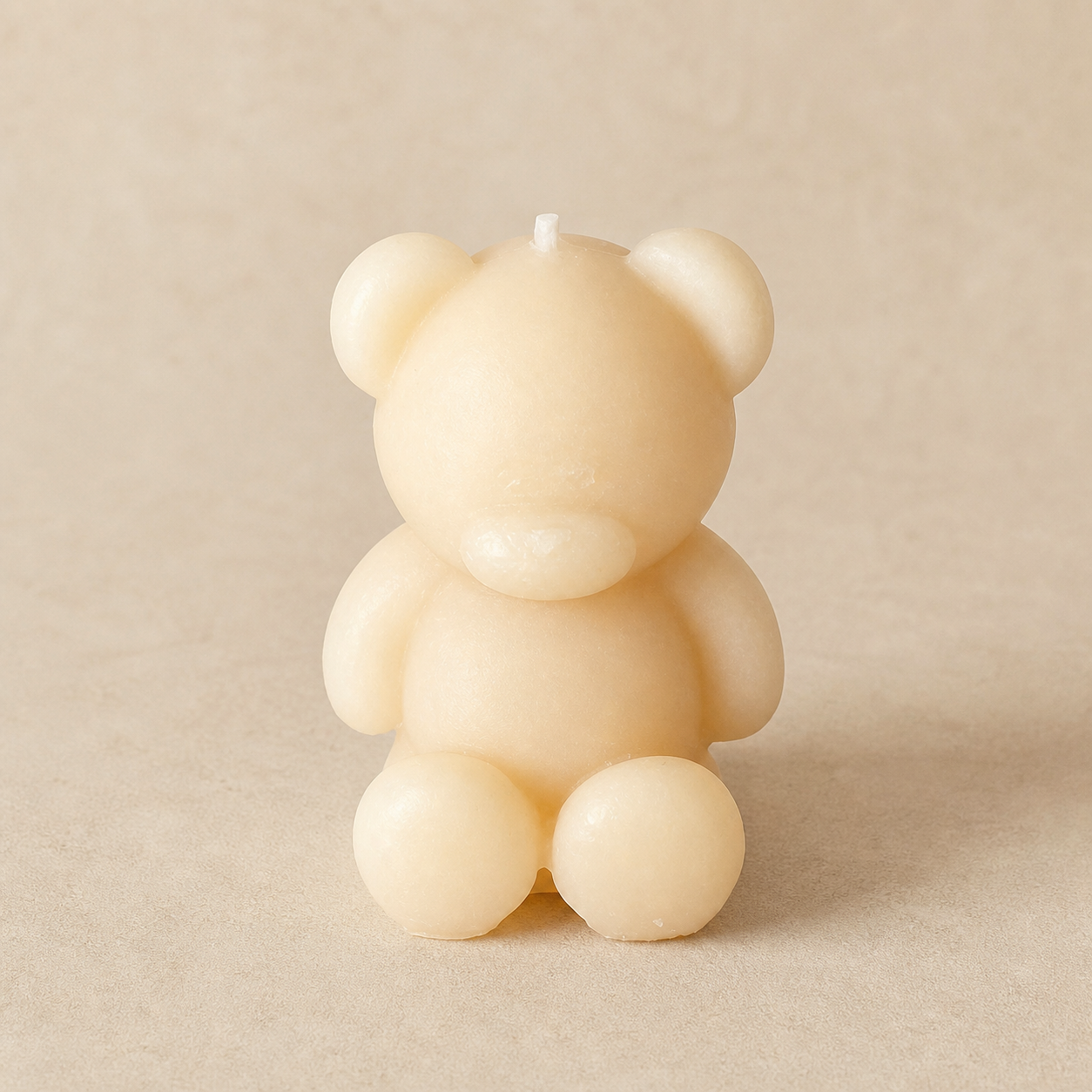 Extra-small smooth ivory teddy candle