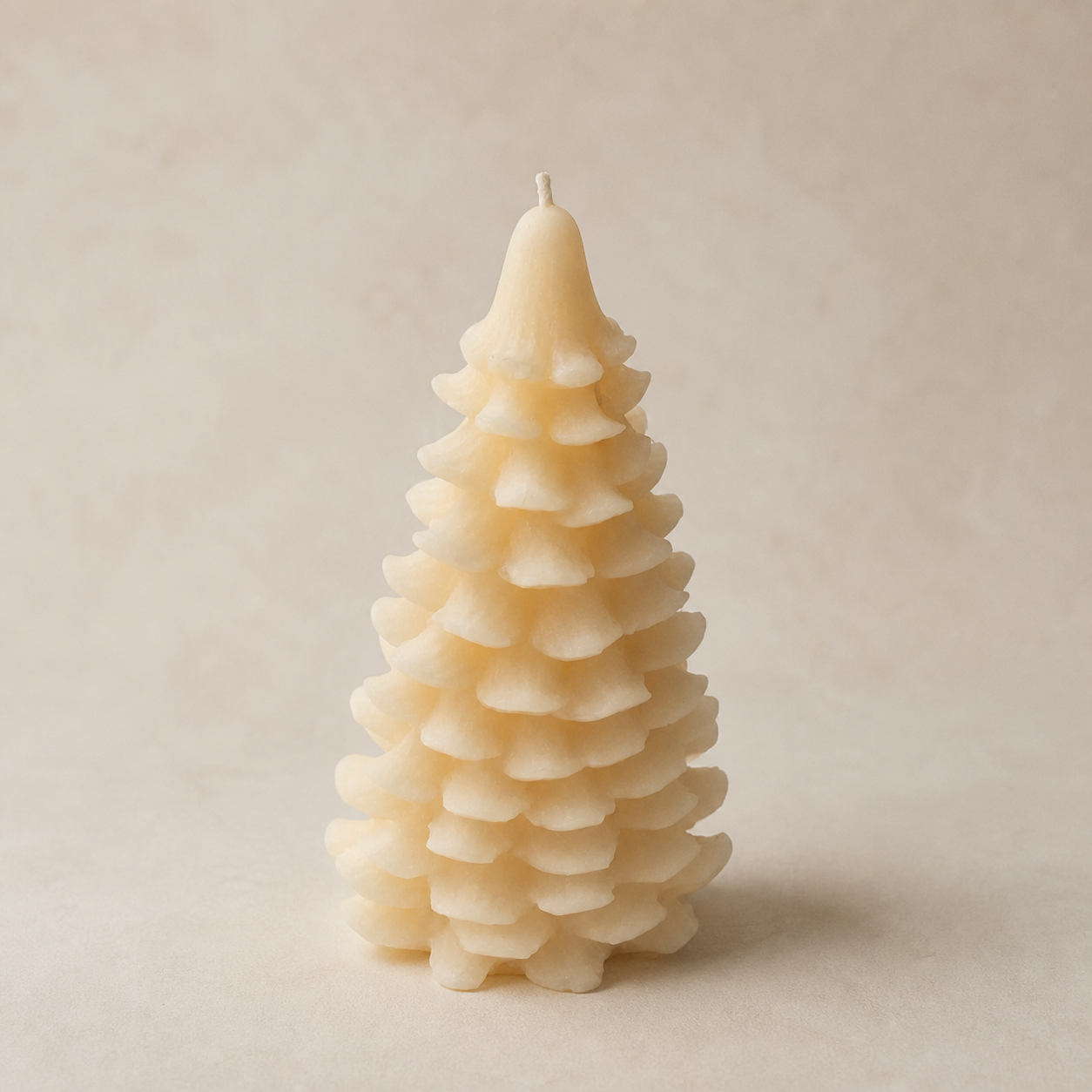 Ivory scalloped fir tree candle