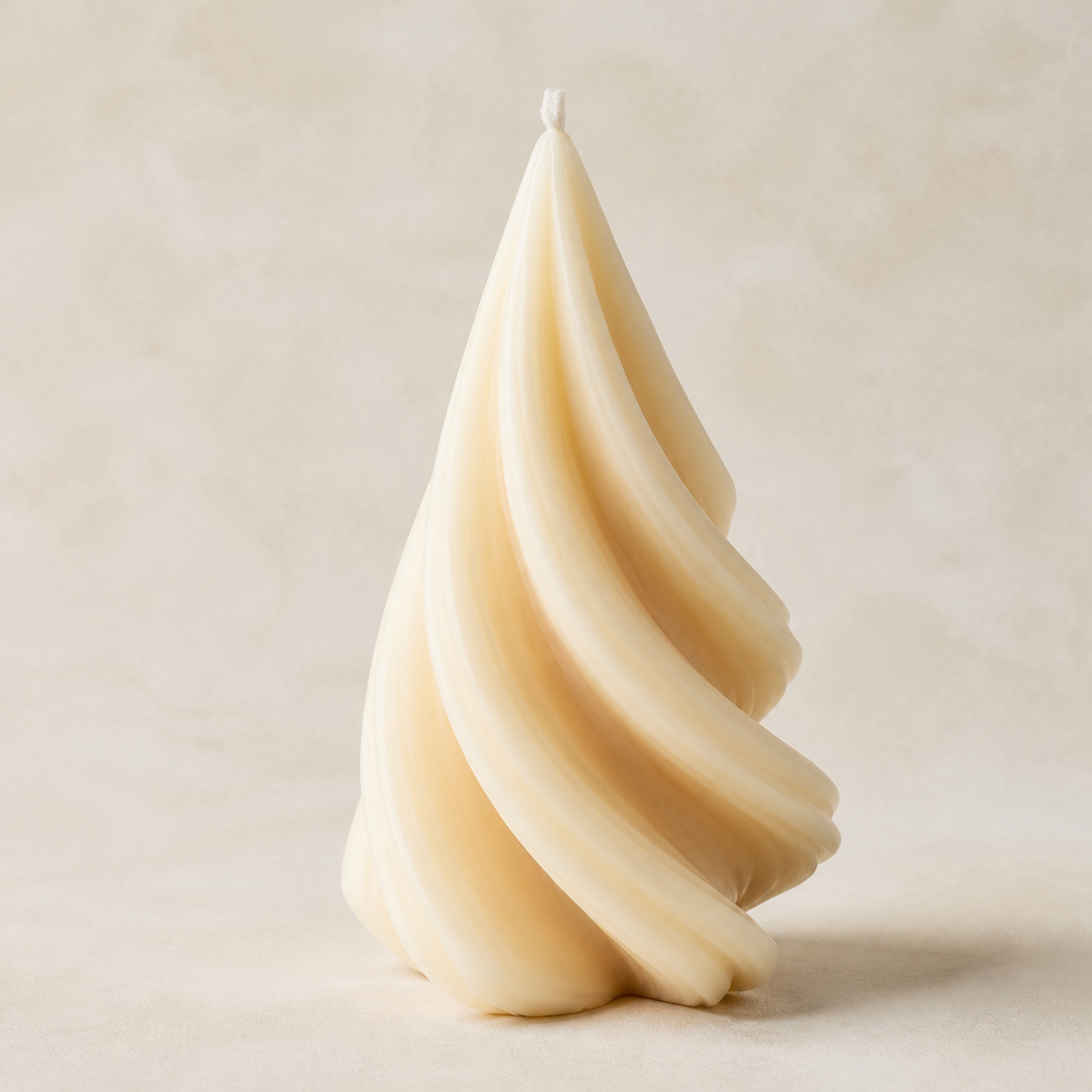 Tall ivory spiral sculptural candle