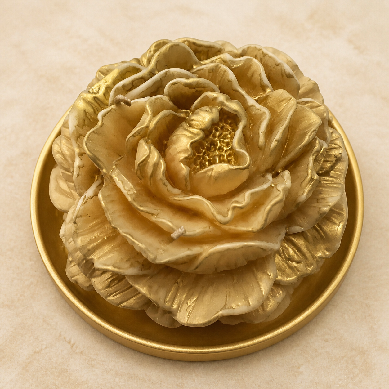 XL ornate peony candle in gold and ivory